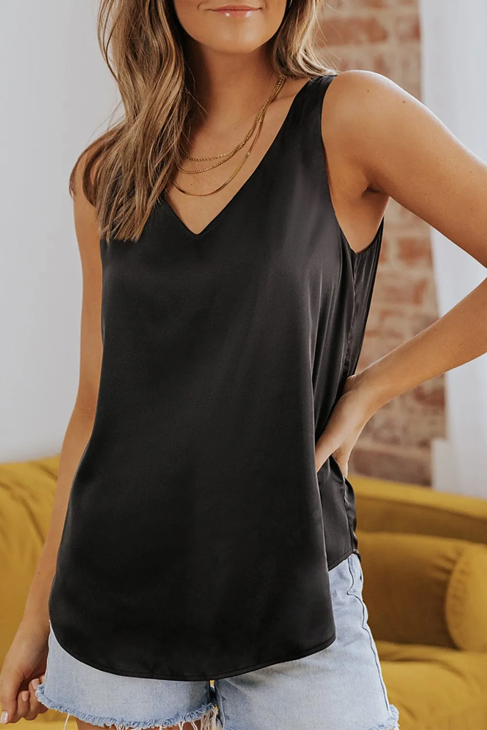 Black Sleeveless V Neck Knotted Blouse